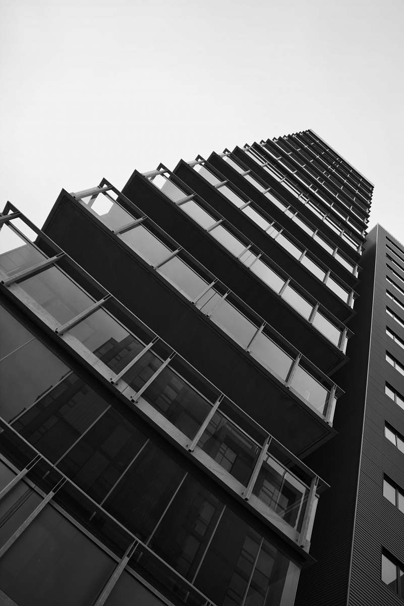 black-and-white low angle photo of building town
